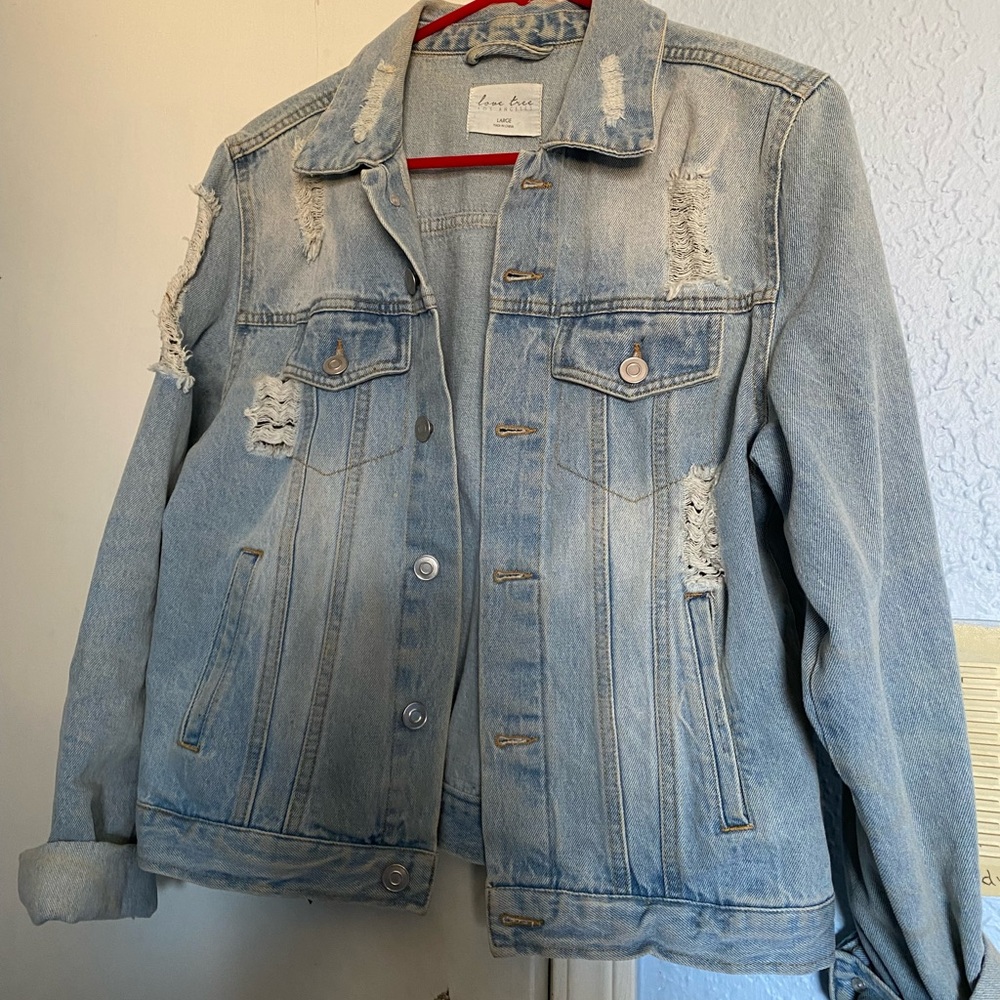 Distressed denim jacket